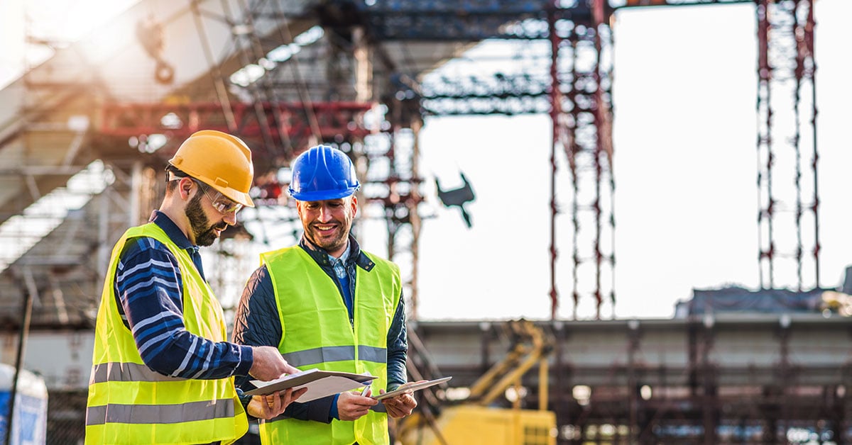 Employees working at a commercial construction job site